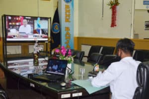Mengikuti Rapim Melalui Video Conference.